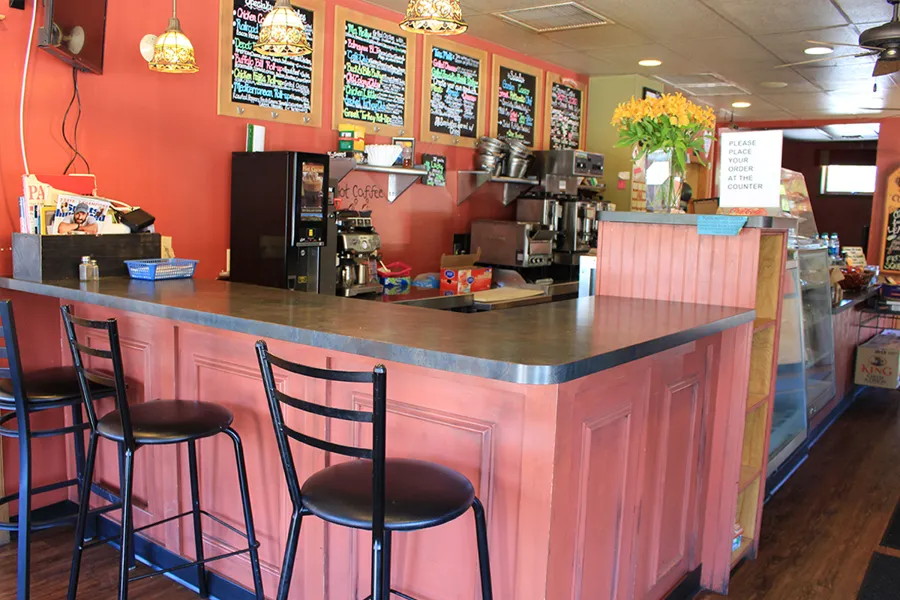 The coffee counter and chalkboard menus at Ma Reilly’s